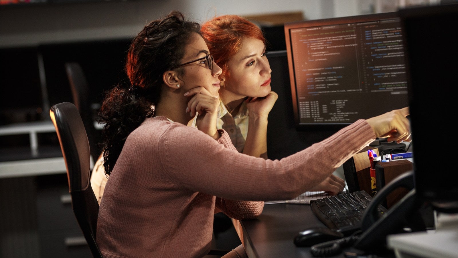 Ladies Accessing Data on Laptop for Generic Inquiries